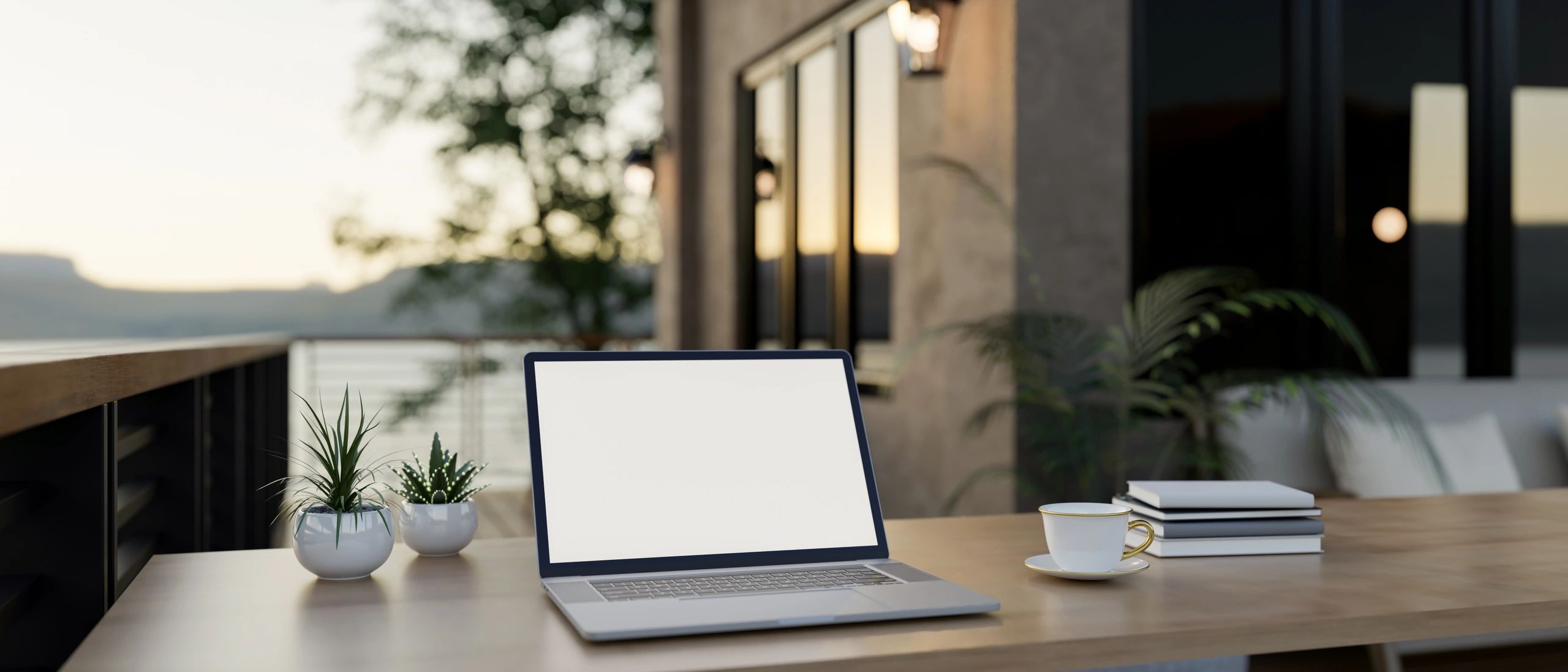 Laptop on a wooden table with a bright screen, ready for learning and planning