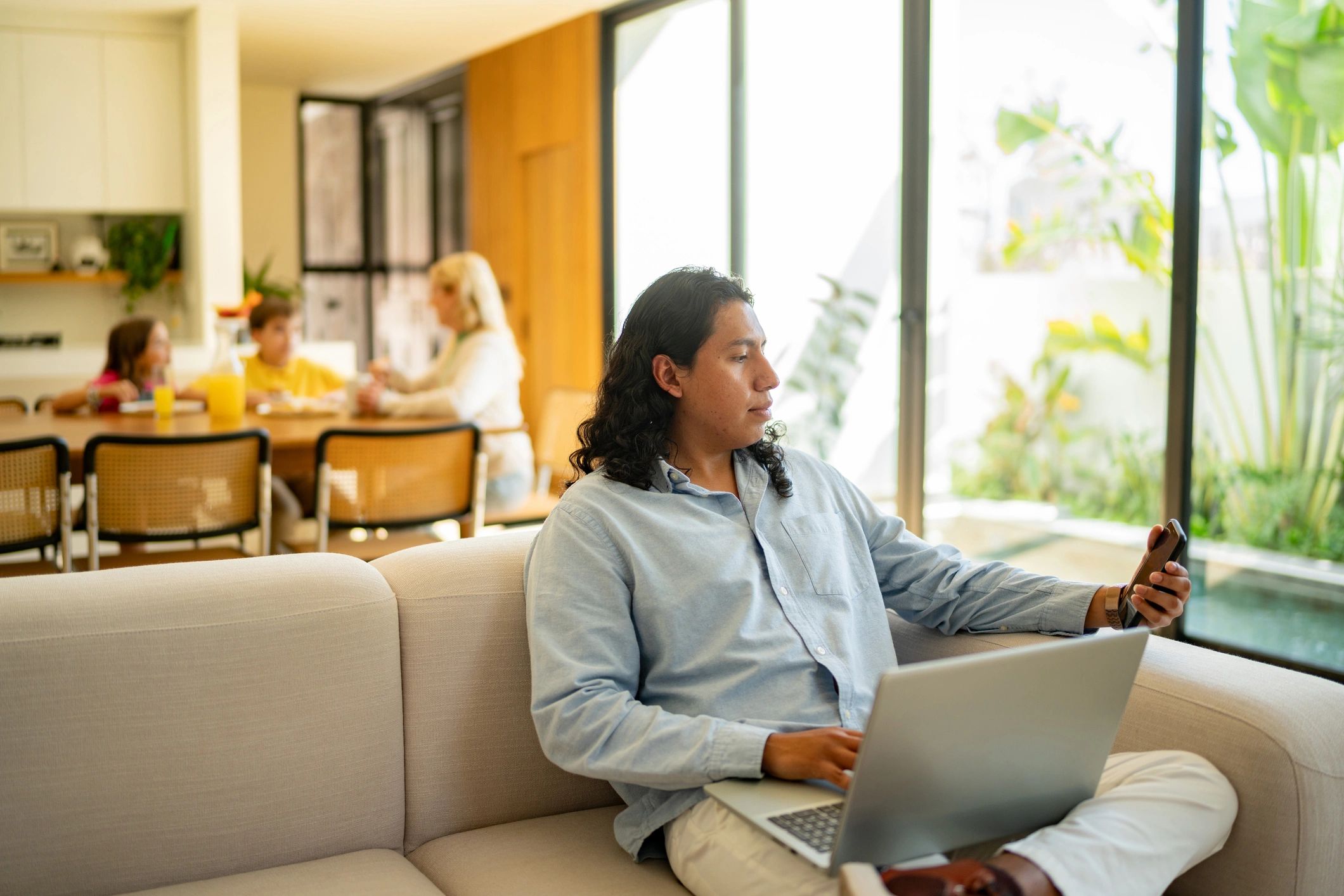 Person working on a laptop at home